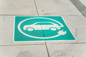 Electric Vehicle Sign on Pavement