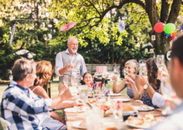 Family celebration or a garden party outside in the backyard.